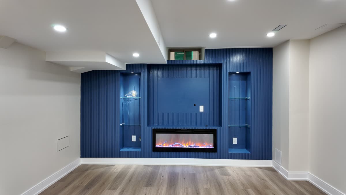 Custom media wall in a Brampton basement renovation